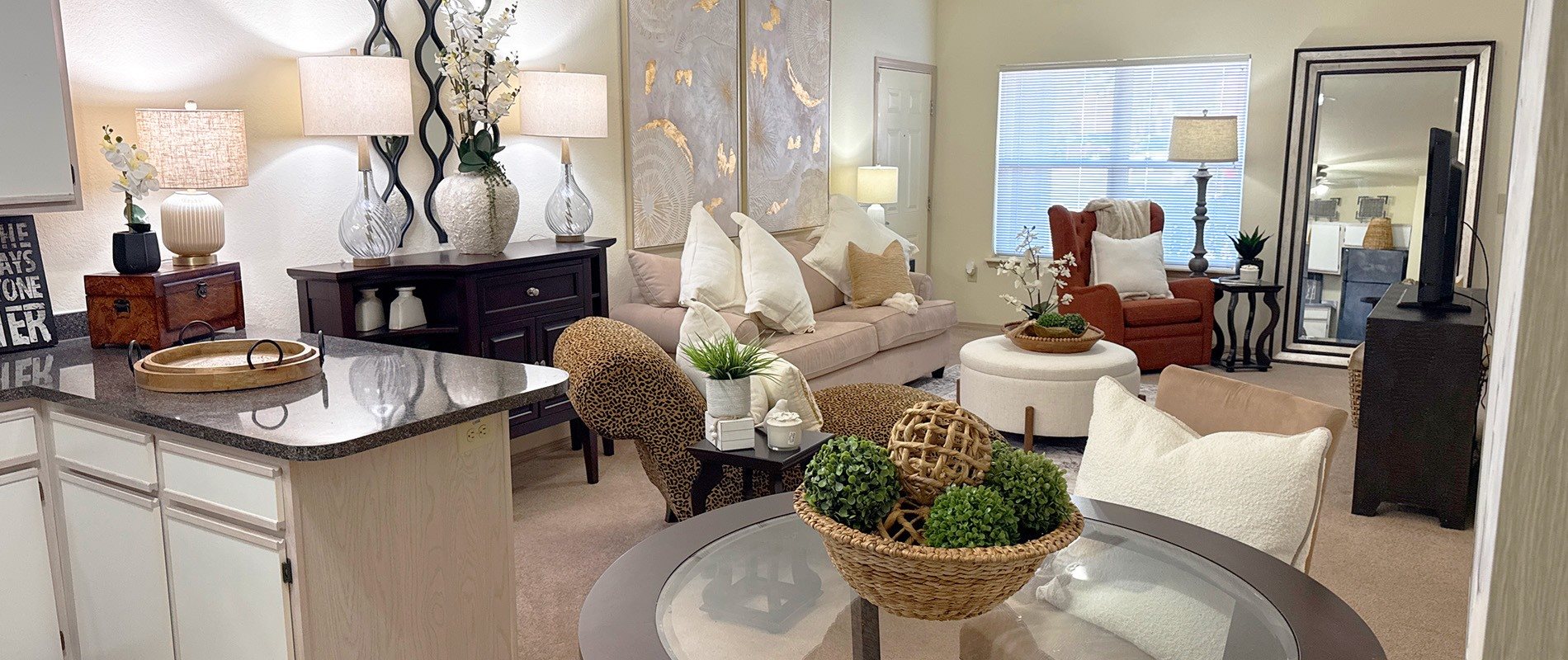 A living room with a black and white color scheme.